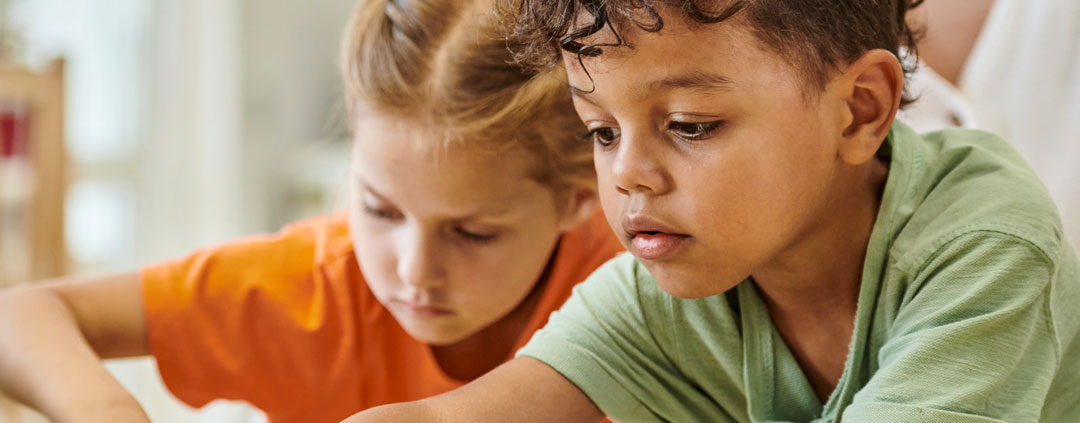 Kids playing at school in the classroom