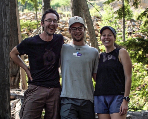 Group photo of True Local supplier Mr.Mercy's Mushrooms at their farm in Kaslo, BC.
