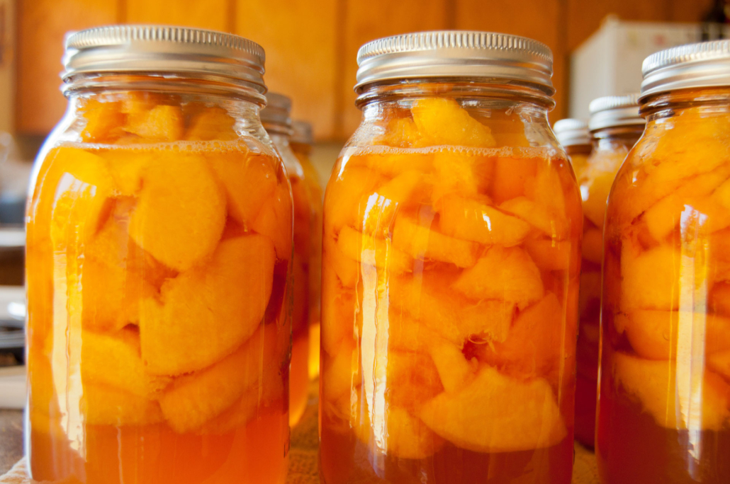 Jars-of-Peaches Canned peaches being prepared
